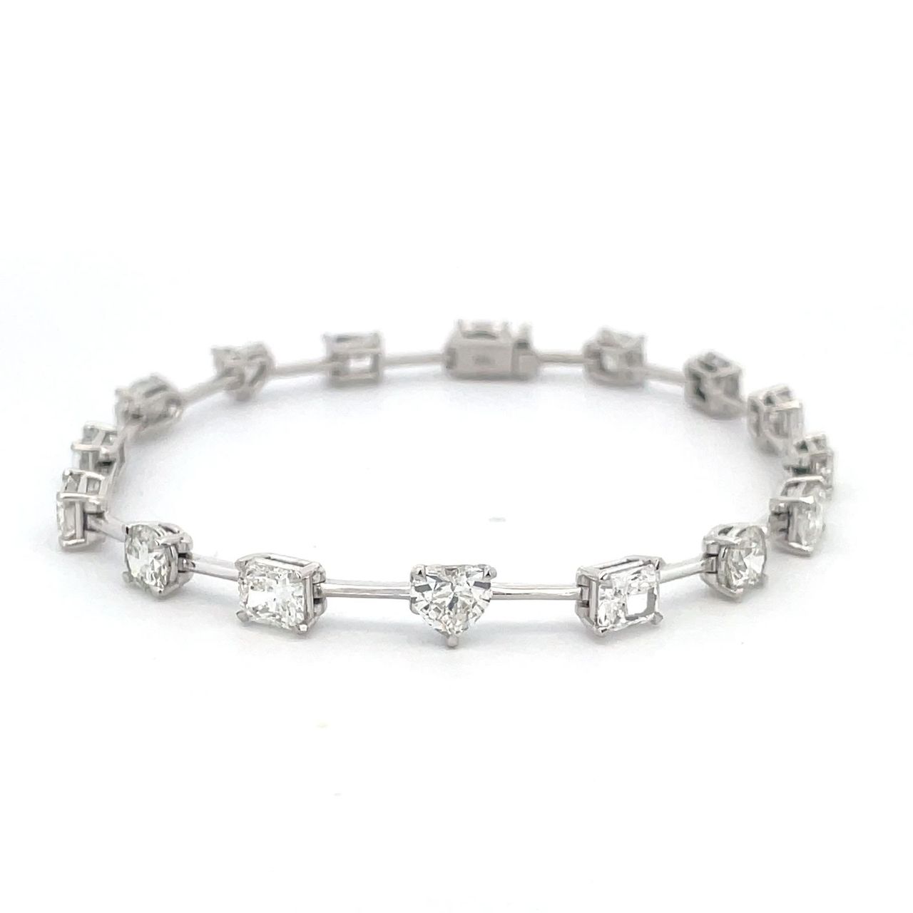 7' Bar style bracelet in 18K WG with basket prong set (16) multi-shape diamonds.  D8.23ct.t.w.