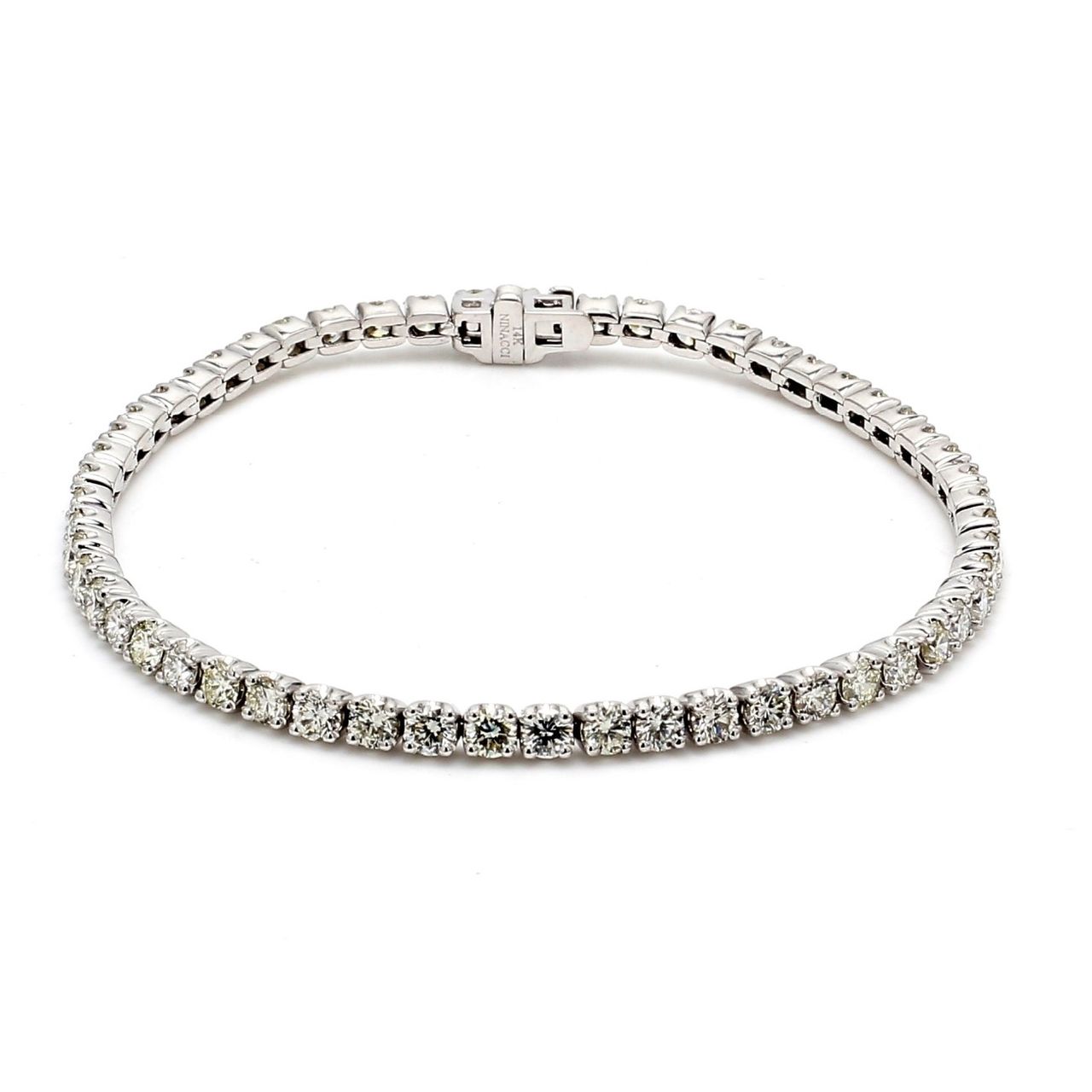 7' Tennis bracelet with crown head prong set (55) round diamonds.  D5.38ct.t.w.