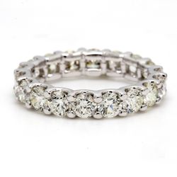 Eternity band with U-prong set round diamonds.  D3.70ct.t.w.