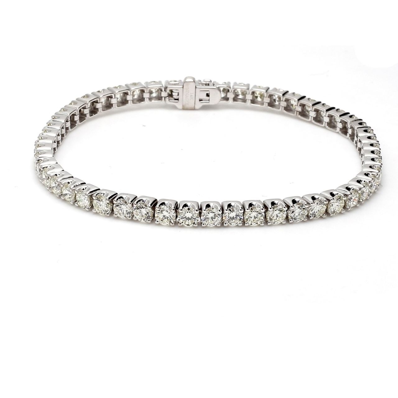 7' Tennis bracelet with crown head set (51) round diamonds.  D7.56ct.t.w.