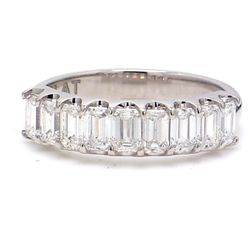 9-stone band in platinum with U-prong set emerald cut diamonds.  D1.12ct.t.w.  Size 5.25