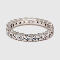 Eternity band with prong set (25) round diamonds.  D1.00ct.t.w.  Size 6