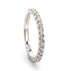 Eternity band with pre-set 4-(30) round diamonds.  D0.51ct.t.w.  Size 6.25