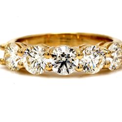 5-stone band in yellow gold with shared prong set round diamonds.  D2.78ct.t.w.  Size 7