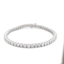 7' Tennis bracelet with basket prong set (85) round diamonds.  D2.20ct.t.w.