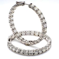 1.25' Inside out hoop earrings with 4-prong set (36) round diamonds & with special spring lock.  D6.86ct.t.w.