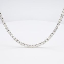 18' Tennis necklace with 4-prong set (180) round diamonds.  D7.12ct.t.w.