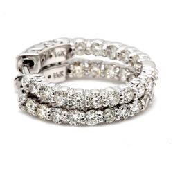 0.75' Inside out hoop earrings with 4-prong set (30) round diamonds & with special spring lock.  D1.74ct.t.w.
