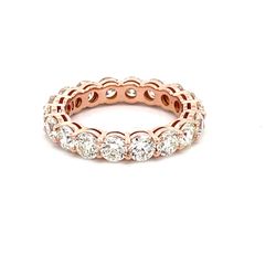 Eternity band in 18K RG with basket shared prong set (18) round diamonds.  D4.35ct.t.w.  Size 7.25