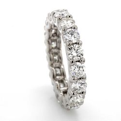 Eternity band with shared U-prong set (20) round diamonds.  D2.69ct.t.w.  Size 6.25