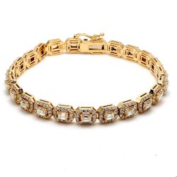 7' Halo bracelet in 14K YG with prong set (23) emerald cuts and pre-set round diamonds.  D7.10ct.t.w.