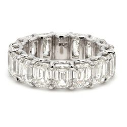 Eternity band in platinum with U-prong set H-I/VS emerald cut diamonds.  D11.38ct.t.w.  Size 6.5