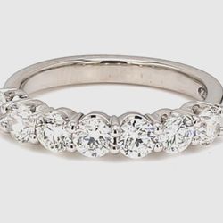 7-stone band in platinum with prong set round diamonds.  D1.28ct.t.w.  Size 6