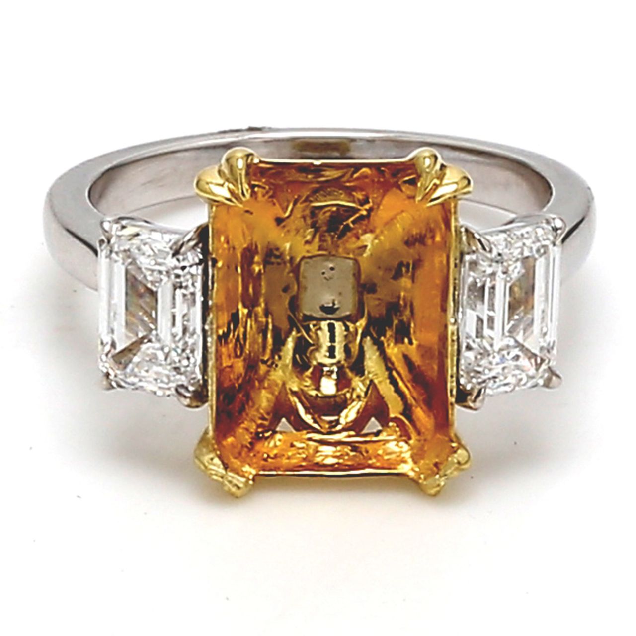 3-stone semi-mount in platinum with GIA certified D/VS2 emerald cut diamond sides.  D1.42ct.t.w.  Size 6.5