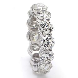 Eternity band in platinum with basket claw set G-H/VS2-SI1 (14) round diamonds.  D8.43ct.t.w.  Size 7.75