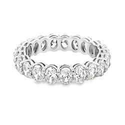 Eternity band in platinum with open basket prong set (21) oval diamonds.  D2.79ct.t.w.  Size 5.5