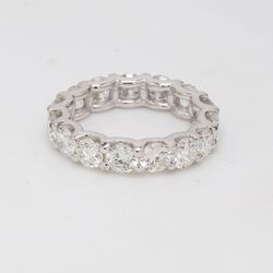 Eternity band with shared U-prong set round diamonds.  D3.88ct.t.w.  Size 4.5