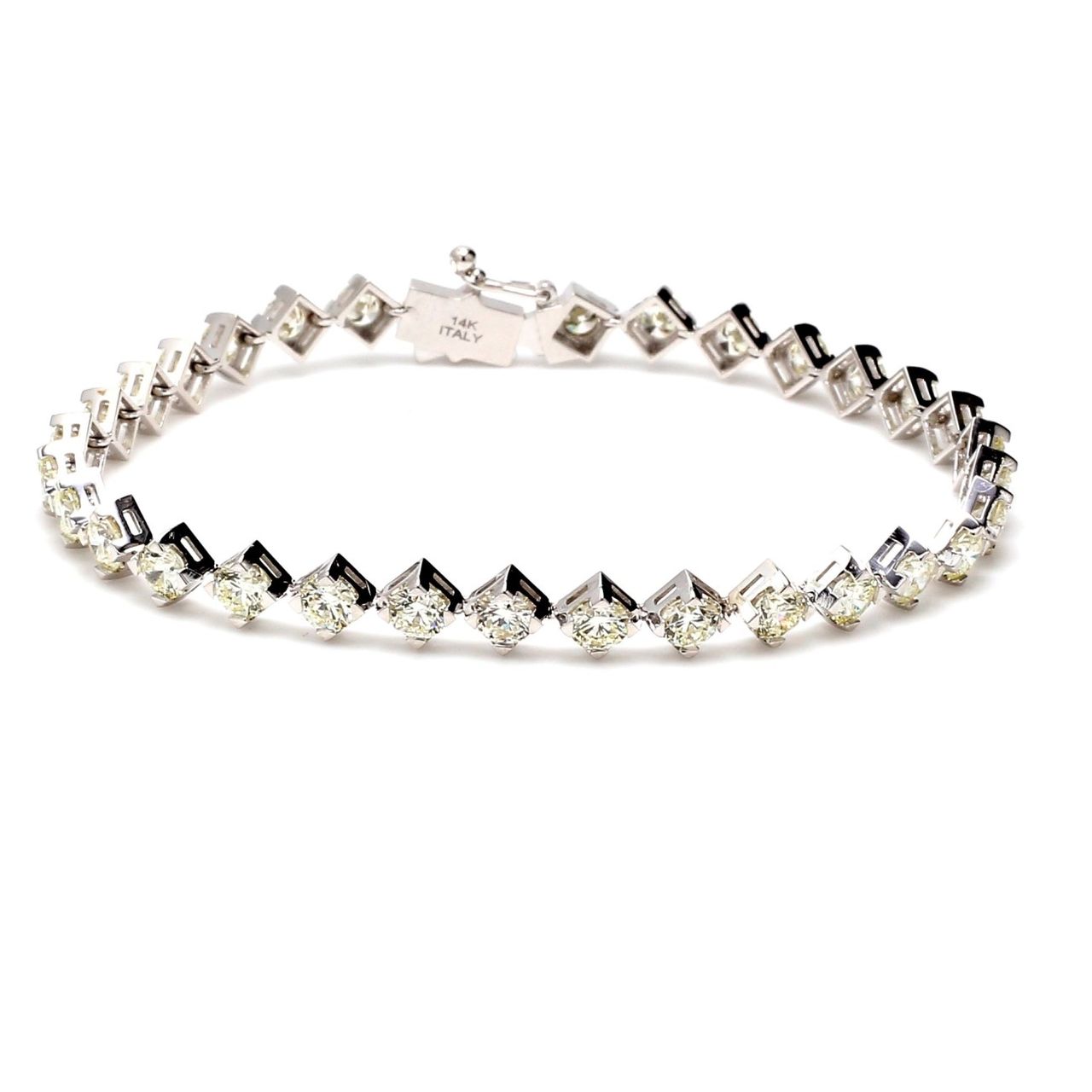 6.75' Tennis bracelet with side ways prong set (32) round diamonds.  D5.99ct.t.w.