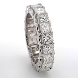 Eternity band in platinum with U-prong set (19) princess cut diamonds.  D4.01ct.t.w.  Size 6
