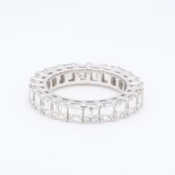 Eternity band in platinum with double basket prong set emerald cut diamonds.  D4.51ct.t.w.