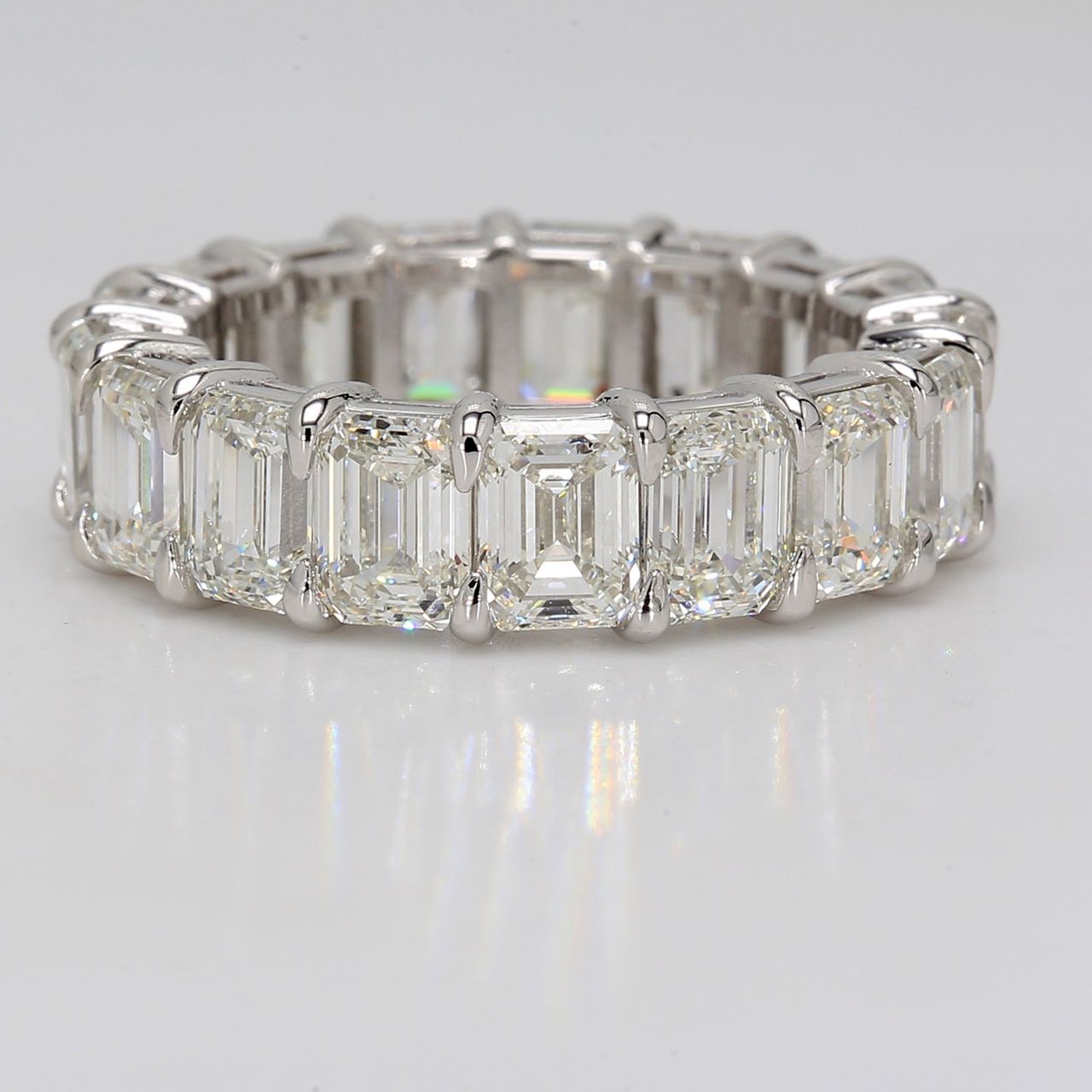 Eternity band in platinum with basket set GIA certified G-I/IF-VS1 (17) emerald cut diamonds.  D8.93ct.t.w.  Size 6.5