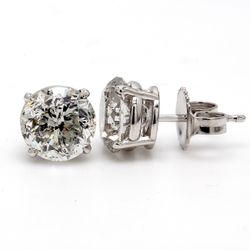 Push back stud earrings with USA certified F-G/I1-I2 round diamonds.  D4.19ct.t.w.