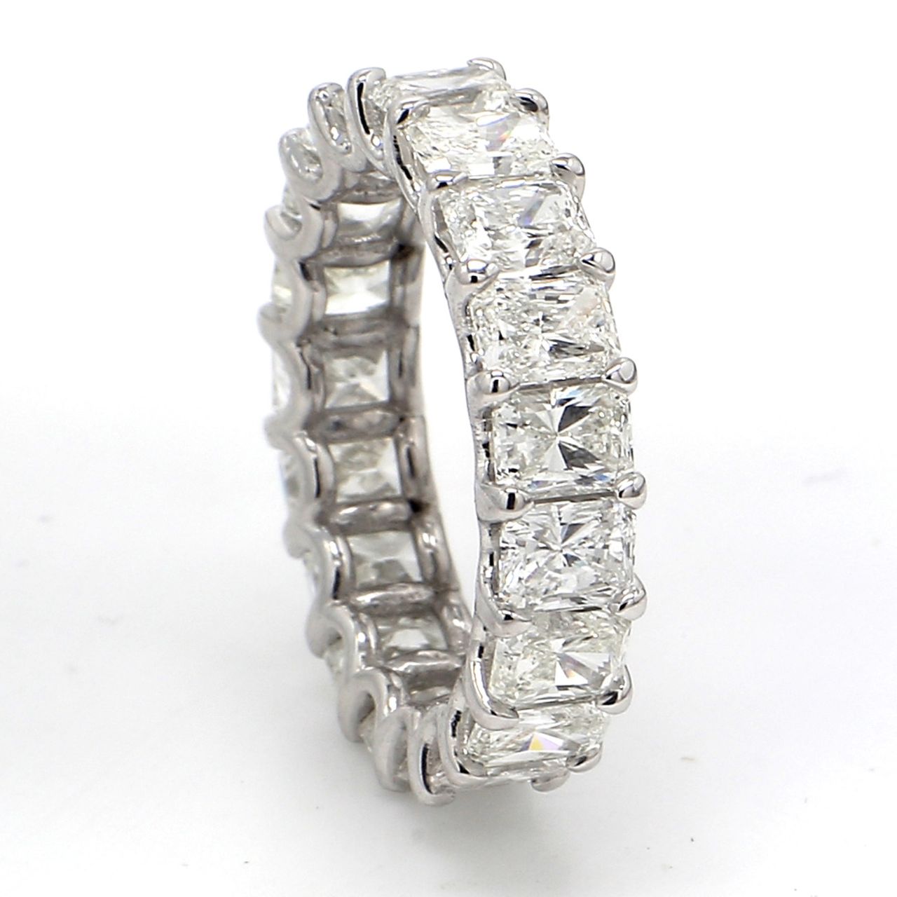 Eternity band in platinum with U-prong set (19) radiant cut diamonds.  D5.12ct.t.w.  Size 5