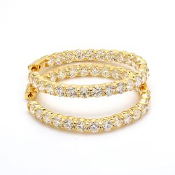 1.5' Inside out hoop earrings in yellow gold with shared prong set (50) round diamonds & with special spring lock.  D11.57ct.t.w.