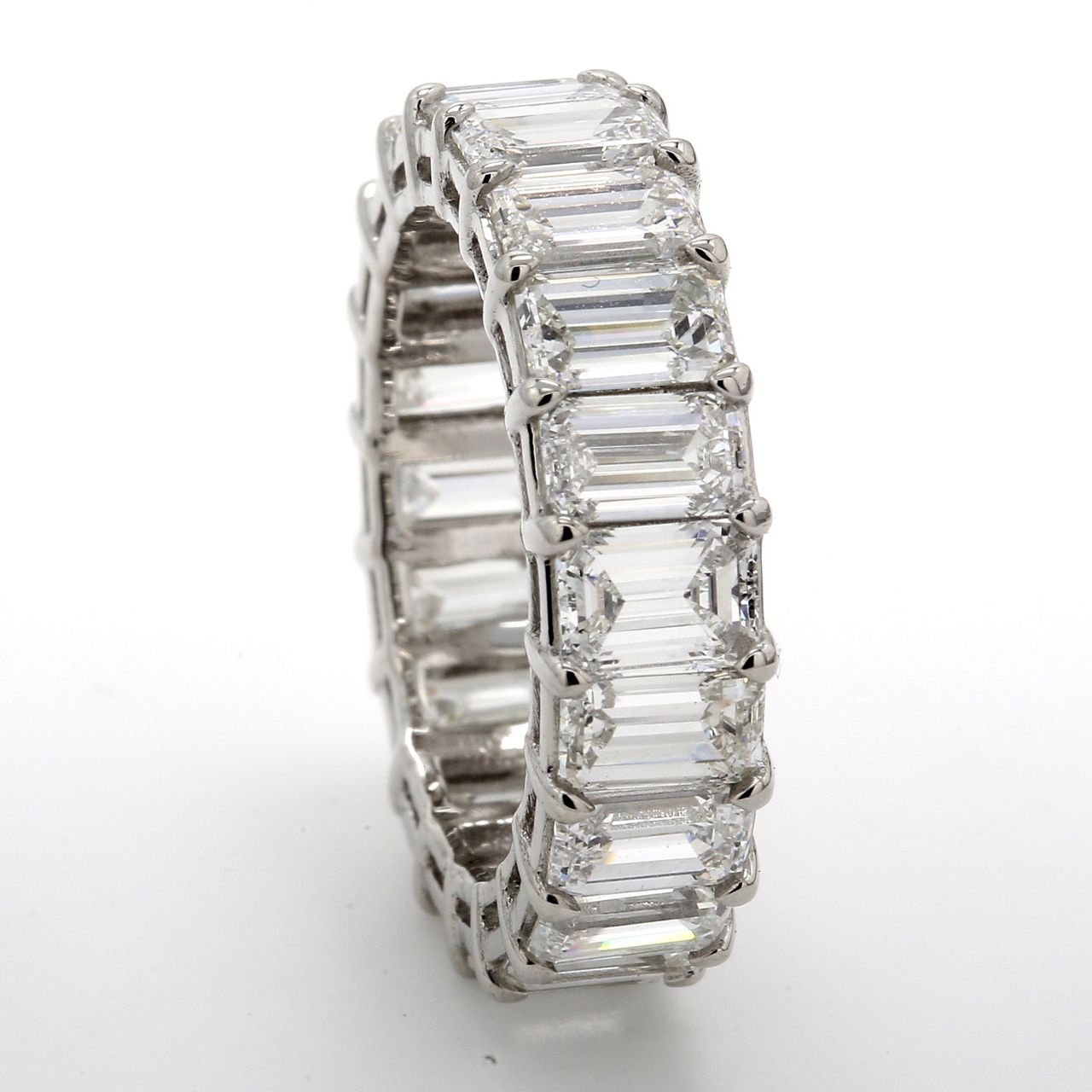 Eternity band in platinum with prong set (20) emerald cut diamonds.  D7.30ct.t.w.  Size 5.5