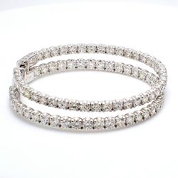 2' Inside out hoop earrings with U-prong set (78) round diamonds & with special spring lock. D7.63ct.t.w.