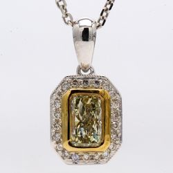 Halo pendant with pre-set rounds & square bezel set fancy yellow radiant diamond center.  D0.64ct.t.w.  (Center 0.52ct.)