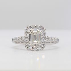 Halo semi-mount in 18K WG with french pave set round diamonds.  D0.53ct.t.w.  Size 6.5