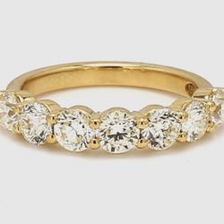 7-stone band in 18K YG with prong set round diamonds.  D1.65ct.t.w.  Size 5.5