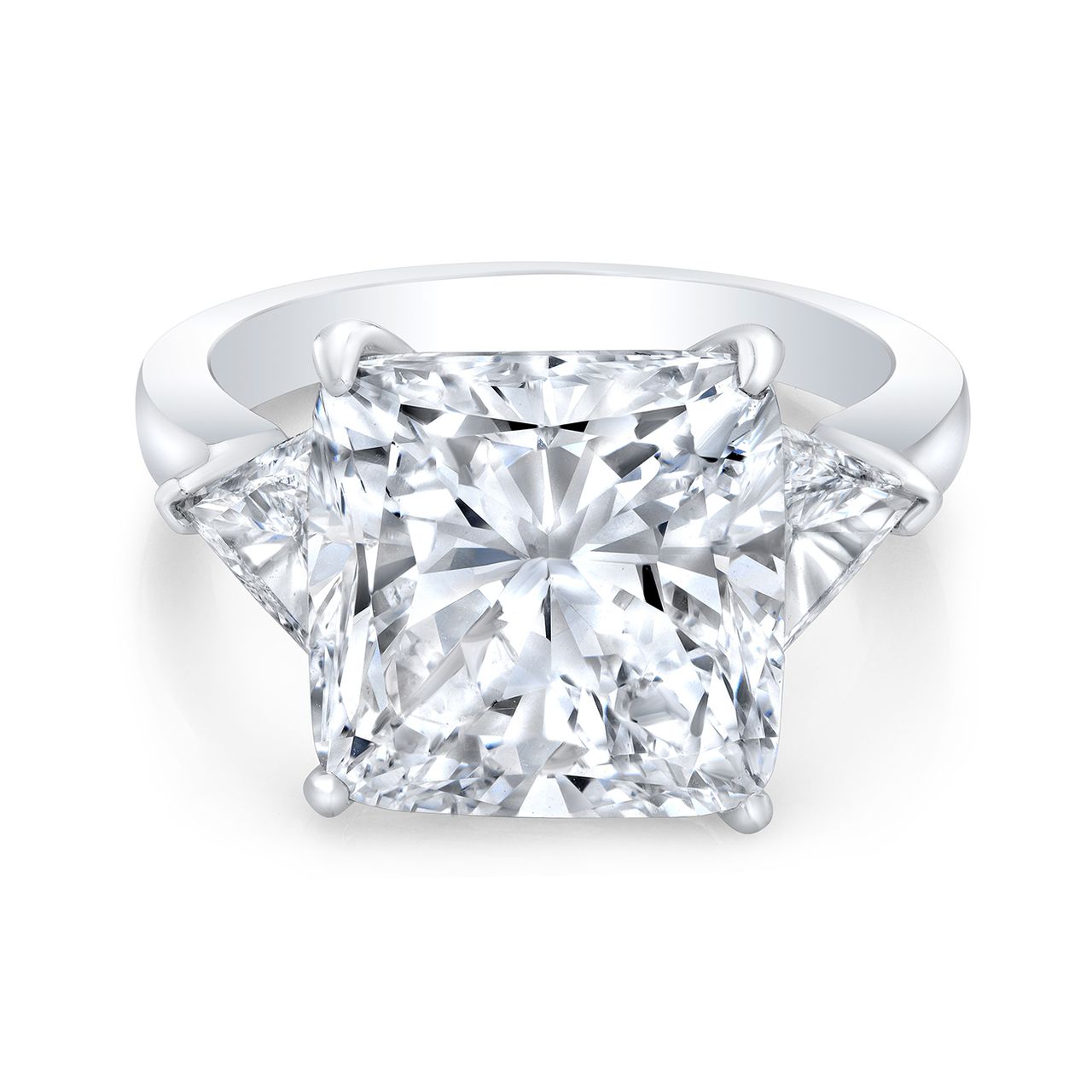3-stone semi-mount in platinum with trilliant cut diamond sides.  D1.27ct.t.w.