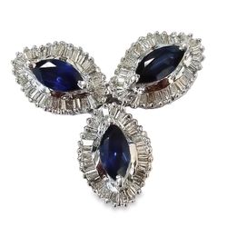 Sapphire slider pendant with prong set marquise shaped sapphires and baguette diamonds.  D2.50ct.t.w.  Sapphire 2.25ct.t.w.