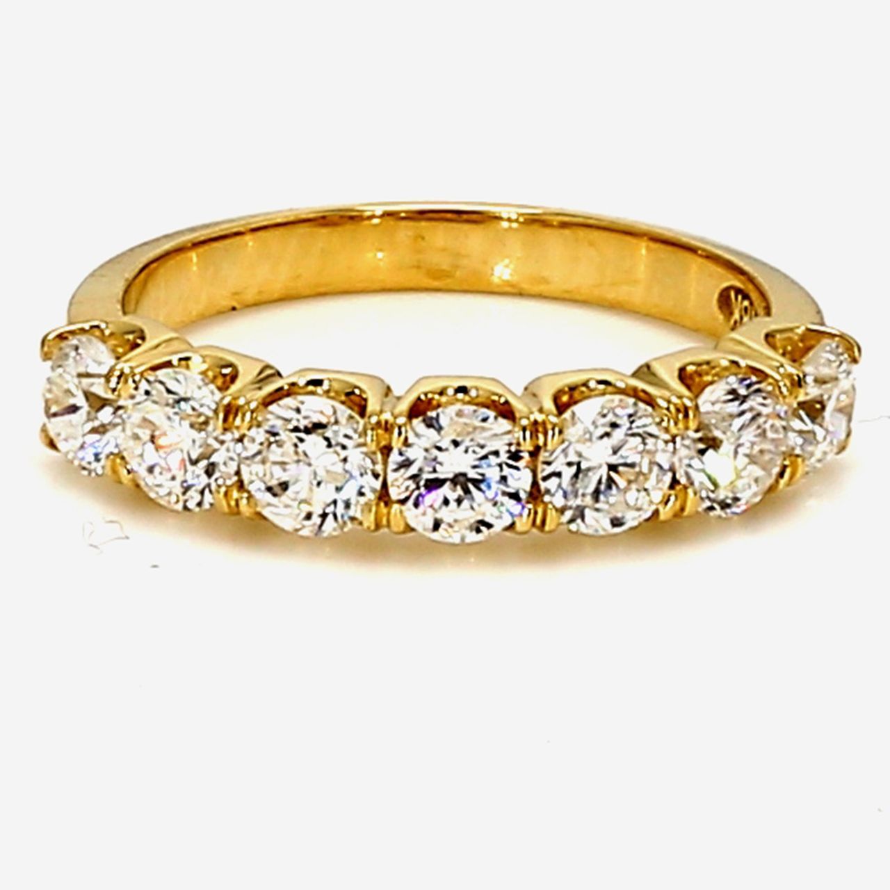 7-stone band in 18K YG with prong set round diamonds.  D1.44ct.t.w.  Size 6.5