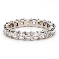 East to west style eternity band with shared prong set (21) emerald cut diamonds.  D2.16ct.t.w.  Size 6