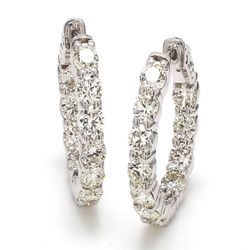 0.75' Inside out hoop earrings with prong set (22) round diamonds.  D5.69ct.t.w.