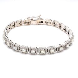 7' Halo tennis bracelet with prong set rounds and emerald cut diamonds.  D7.10ct.t.w.