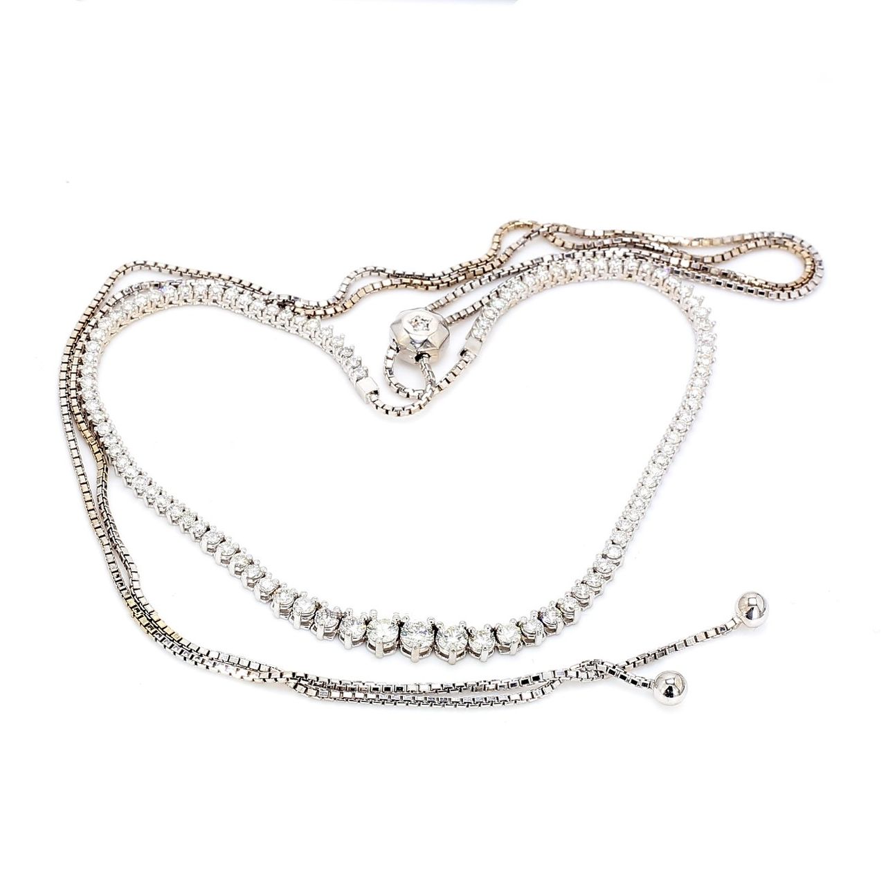 33' Graduated expandable tennis necklace with 3-prong set (103) round diamonds.  D2.83ct.t.w.