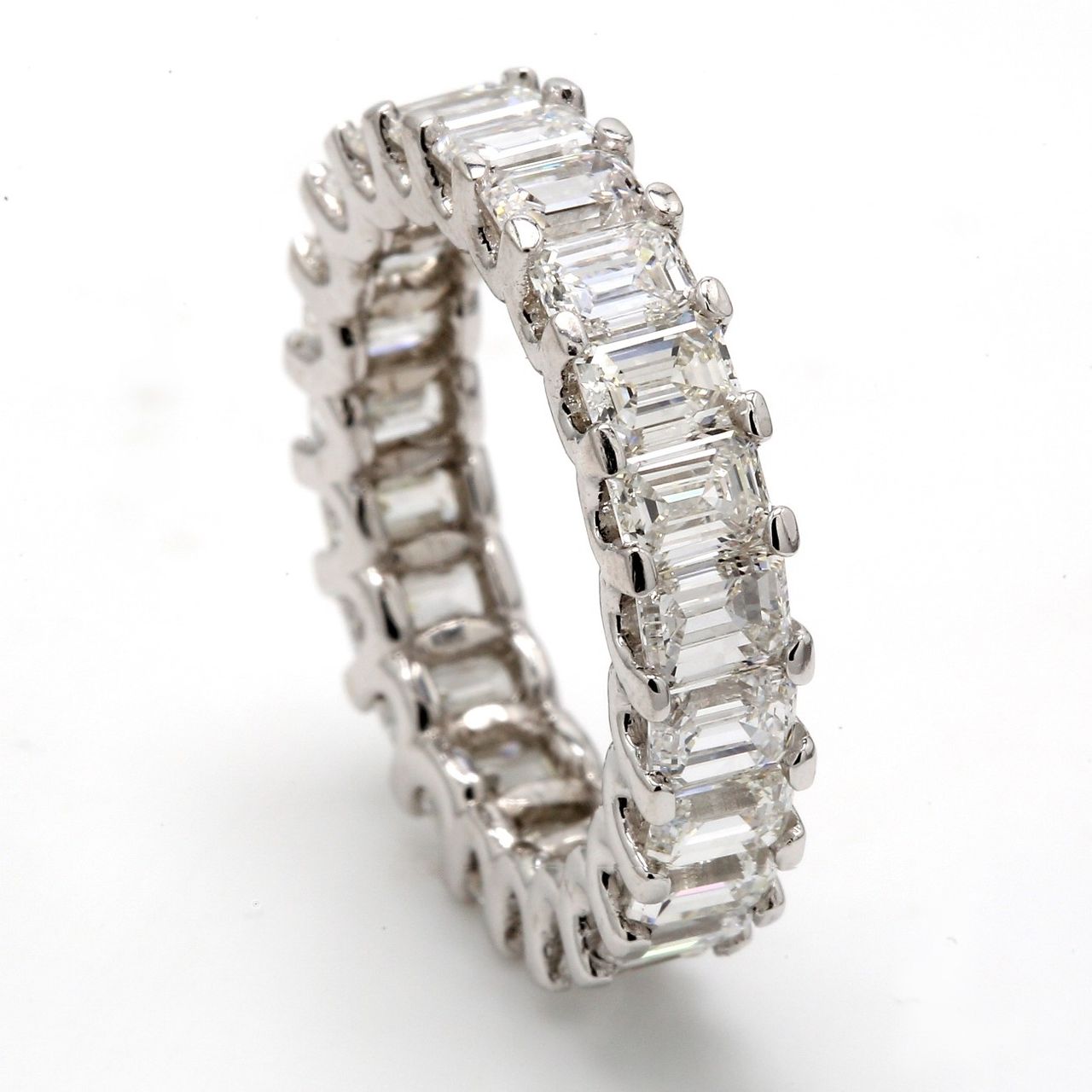 Eternity band with U-prong set emerald cut diamonds.  D5.81ct.t.w.