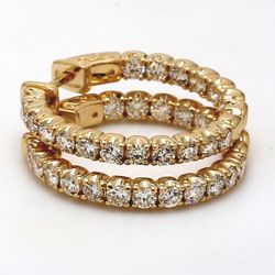 1' Inside out hoop earrings in yellow gold with prong set (38) round diamonds.  D2.36ct.t.w.