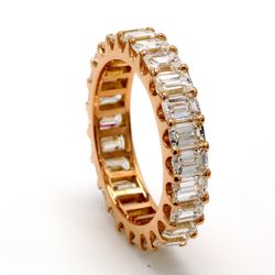 Eternity band in 18K RG with U-prong set (24) emerald cut diamonds.  D3.46ct.t.w.  Size 5