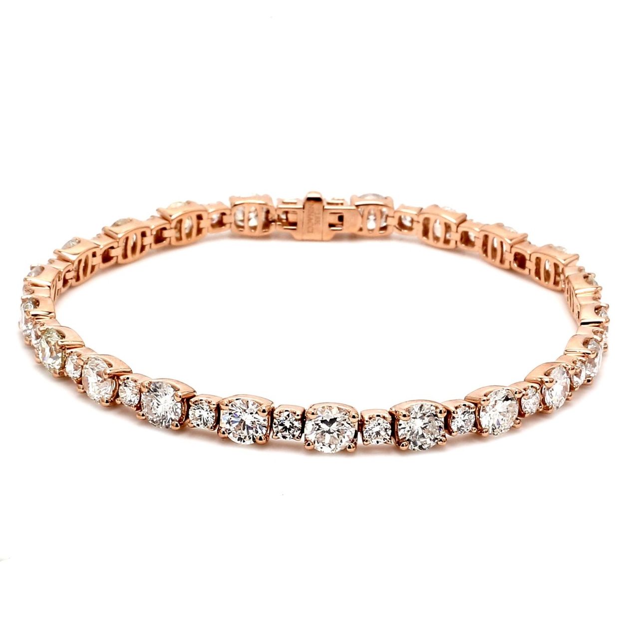 7' Tennis bracelet in 18K RG with prong set alternating sized round diamonds.  D9.83ct.t.w.
