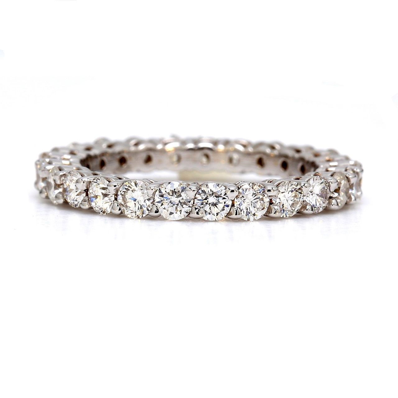 Eternity band with shared prong set (25) round diamonds.  D1.60ct.t.w.  Size 5.75