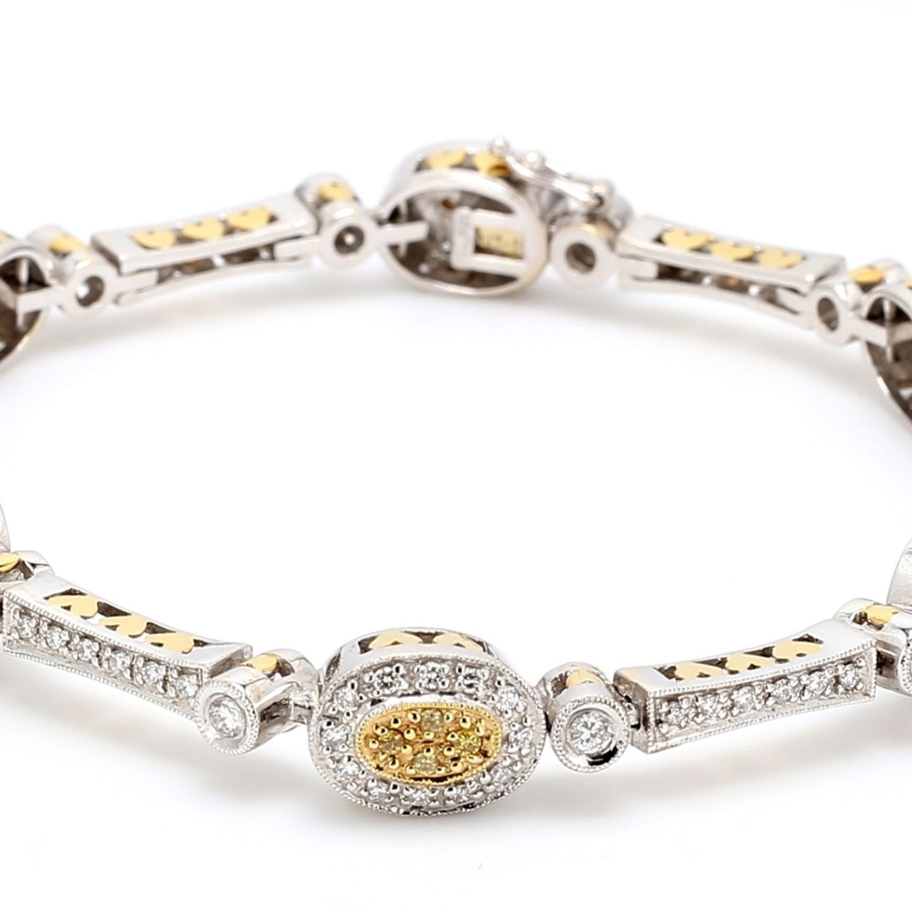 Bracelet in 18K two-tone with round white & yellow diamonds.  D2.33ct.t.w.