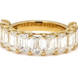 11-stone band in 18K YG with U-prong set GIA certified E-G/VVS2-VS2 emerald cut diamonds.  D7.83ct.t.w.  Size 9
