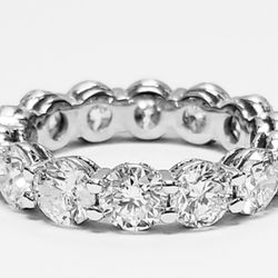 Eternity band in with prong set round diamonds.  D7.16ct.t.w.