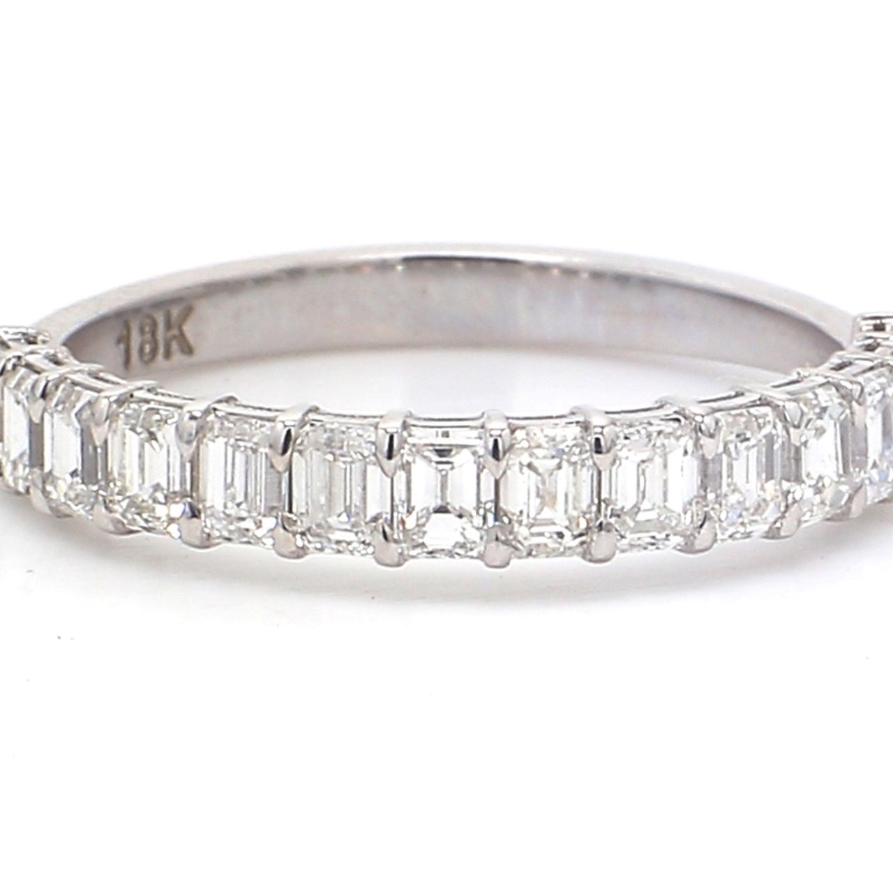 14-stone band in 18K WG with prong set emerald cut diamonds.  D1.21ct.t.w.  Size 6.25