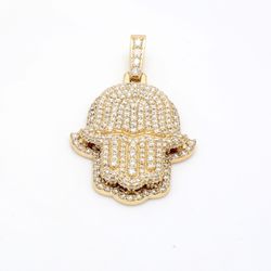 Hamsa pendant in 14K YG with pave set round diamonds.  D3.86ct.t.w.